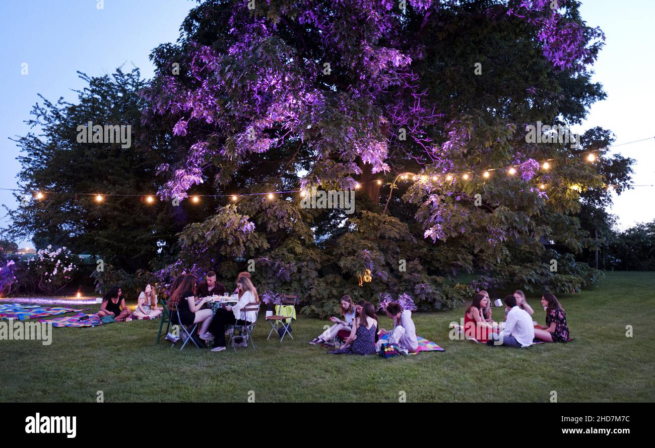 House's garden night party in a summer night Stock Photo