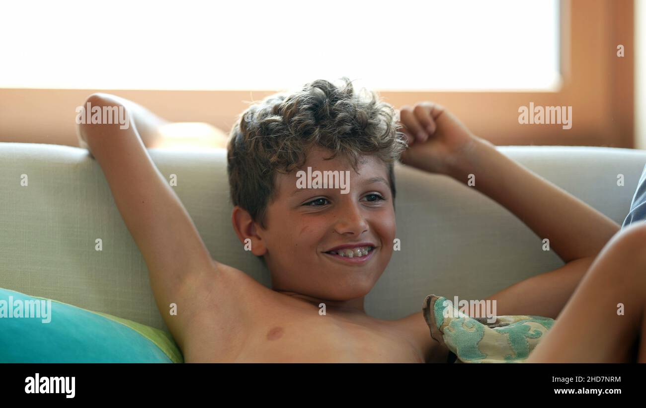 Happy excited child celebrating raising arms in the air in joy Stock ...