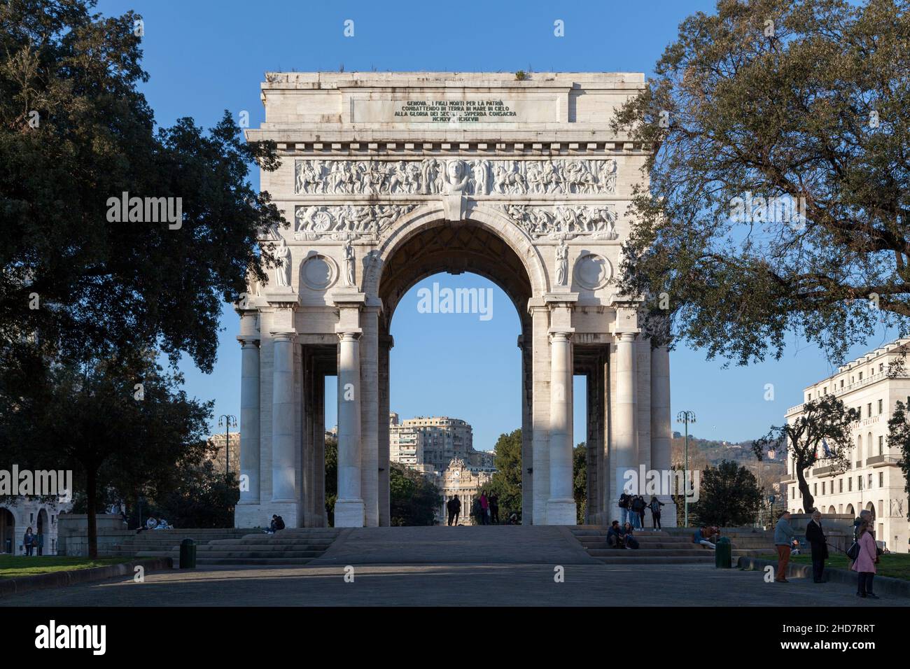 Genova, Italy - March 29 2019: The Arco della Vittoria (Victory Arch), also known as Monumento ai Caduti or Arco dei Caduti (Arch of the Fallen), is a Stock Photo