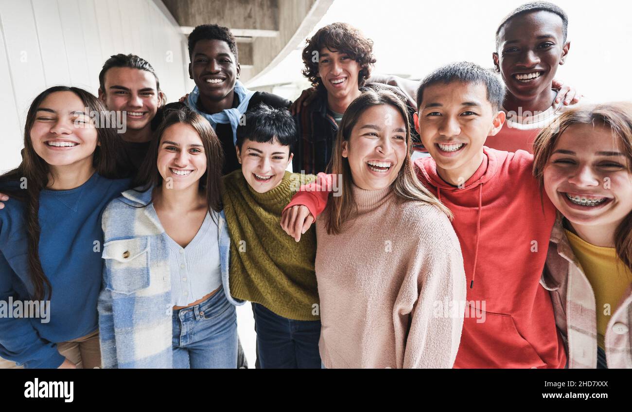 Portrait of multiracial friends having fun smiling on camera outdoor ...
