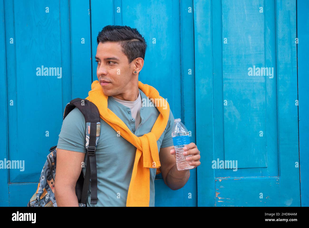 Young hispanic men with a bottle of water, Panama Stock Photo