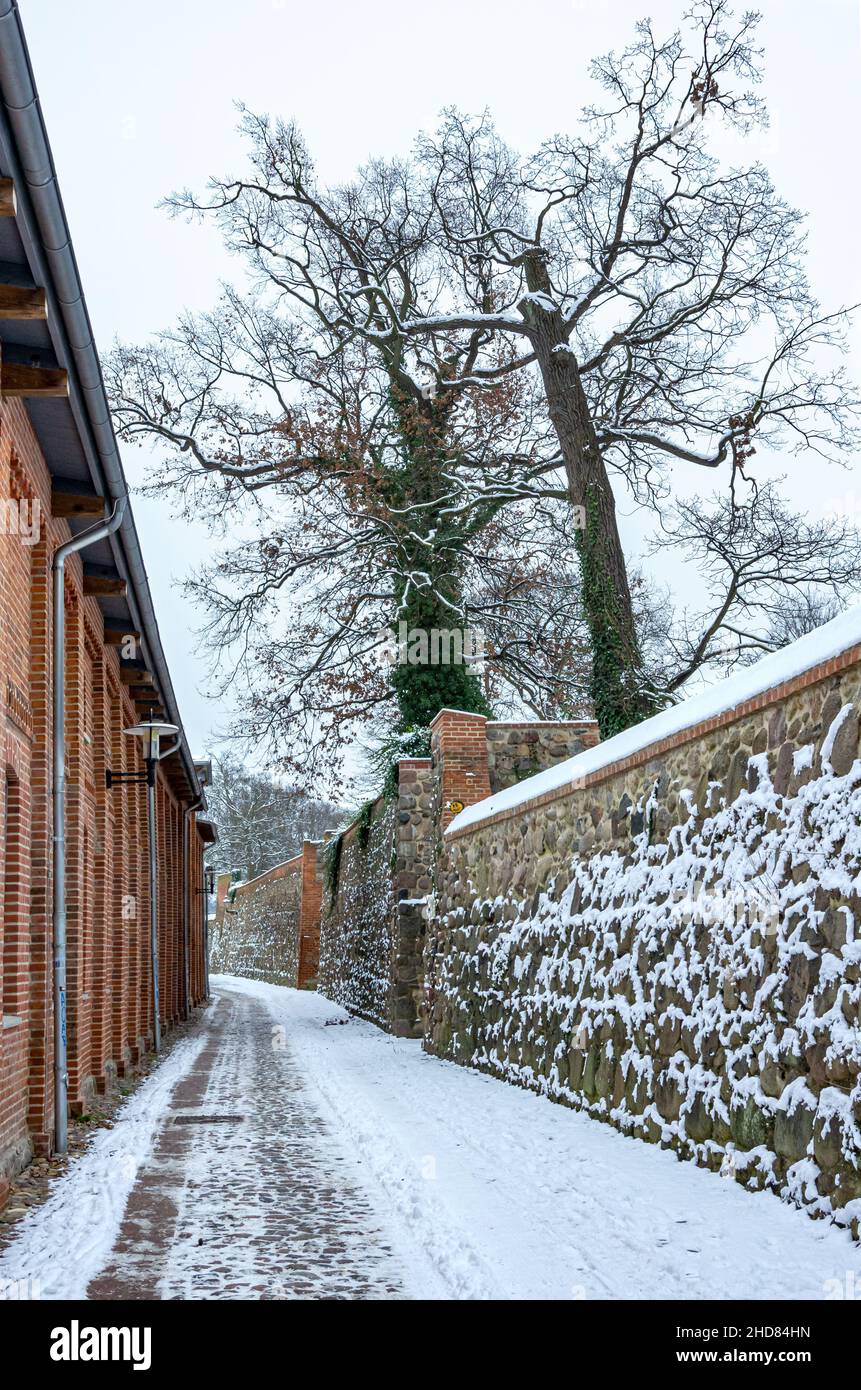 Neubrandenburg, Mecklenburg-Western Pomerania, Germany: Winter impressions on Ring Route between historic architecture and the medieval town wall. Stock Photo