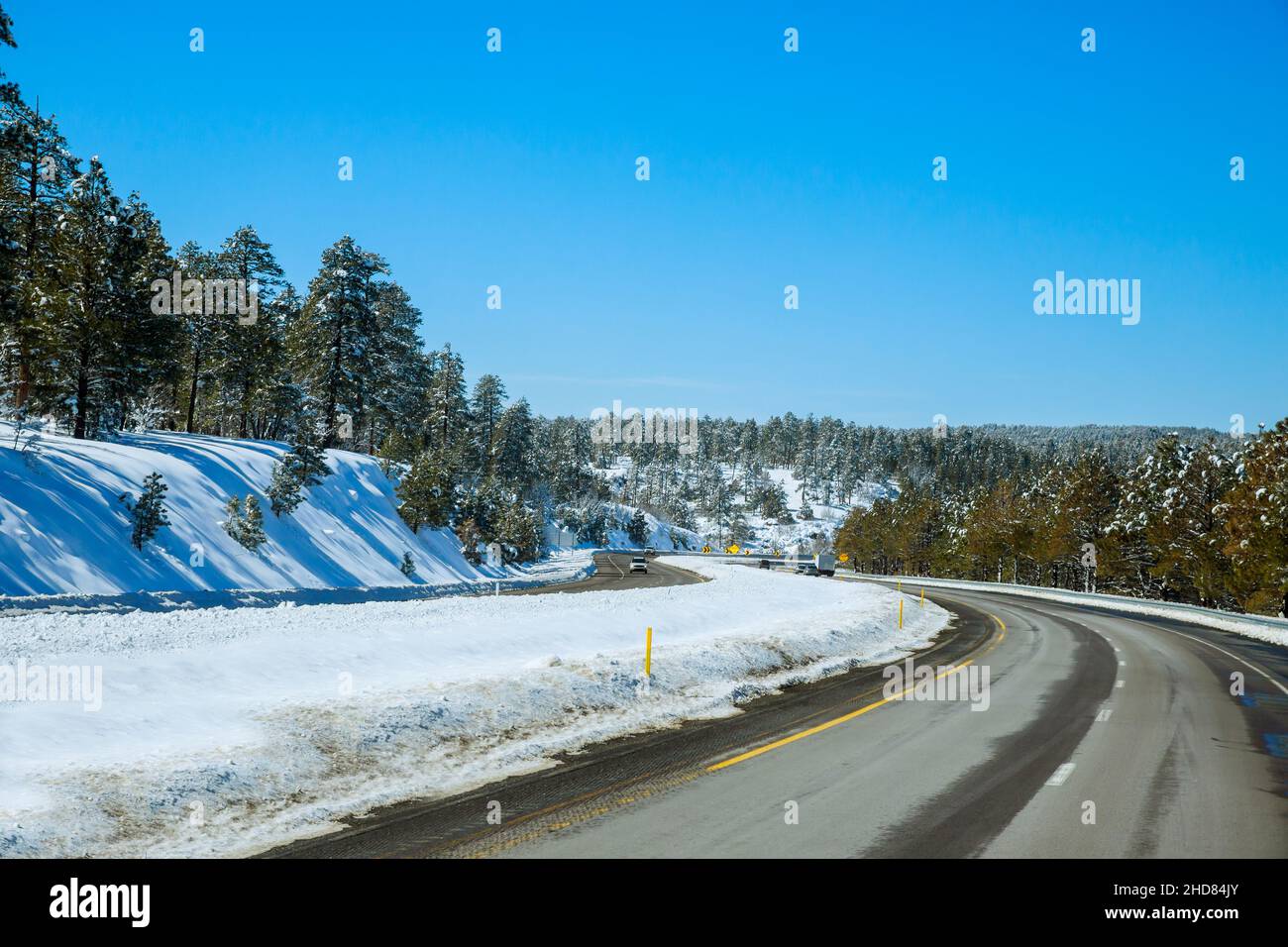 Winter road trees with the mountain snow landscape in Arizona Stock ...