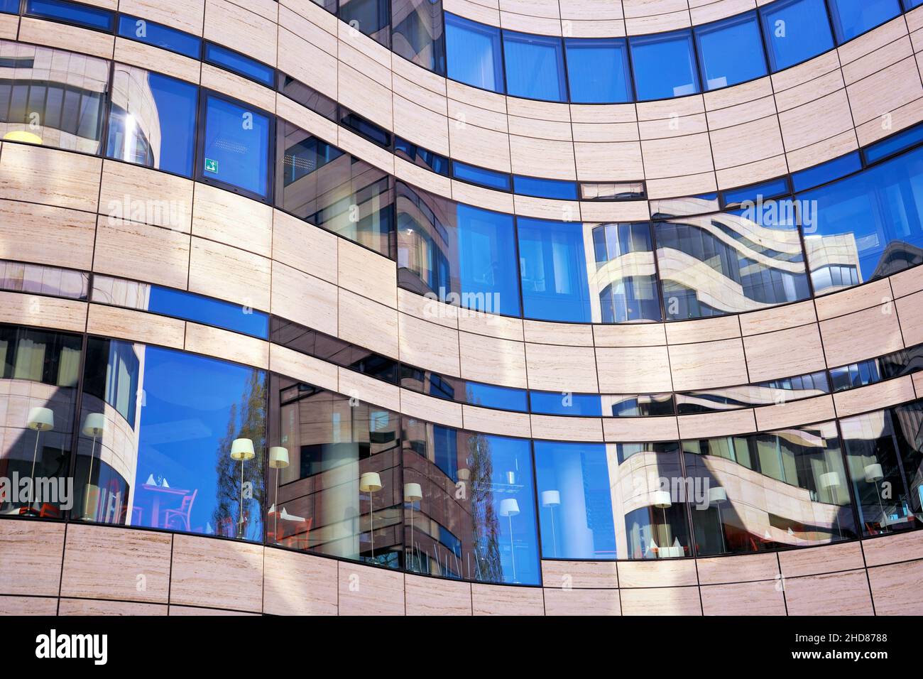 Modern building with glass reflection at Kö-Bogen I in Düsseldorf/Germany, designed by the New York star architect Daniel Libeskind. Stock Photo