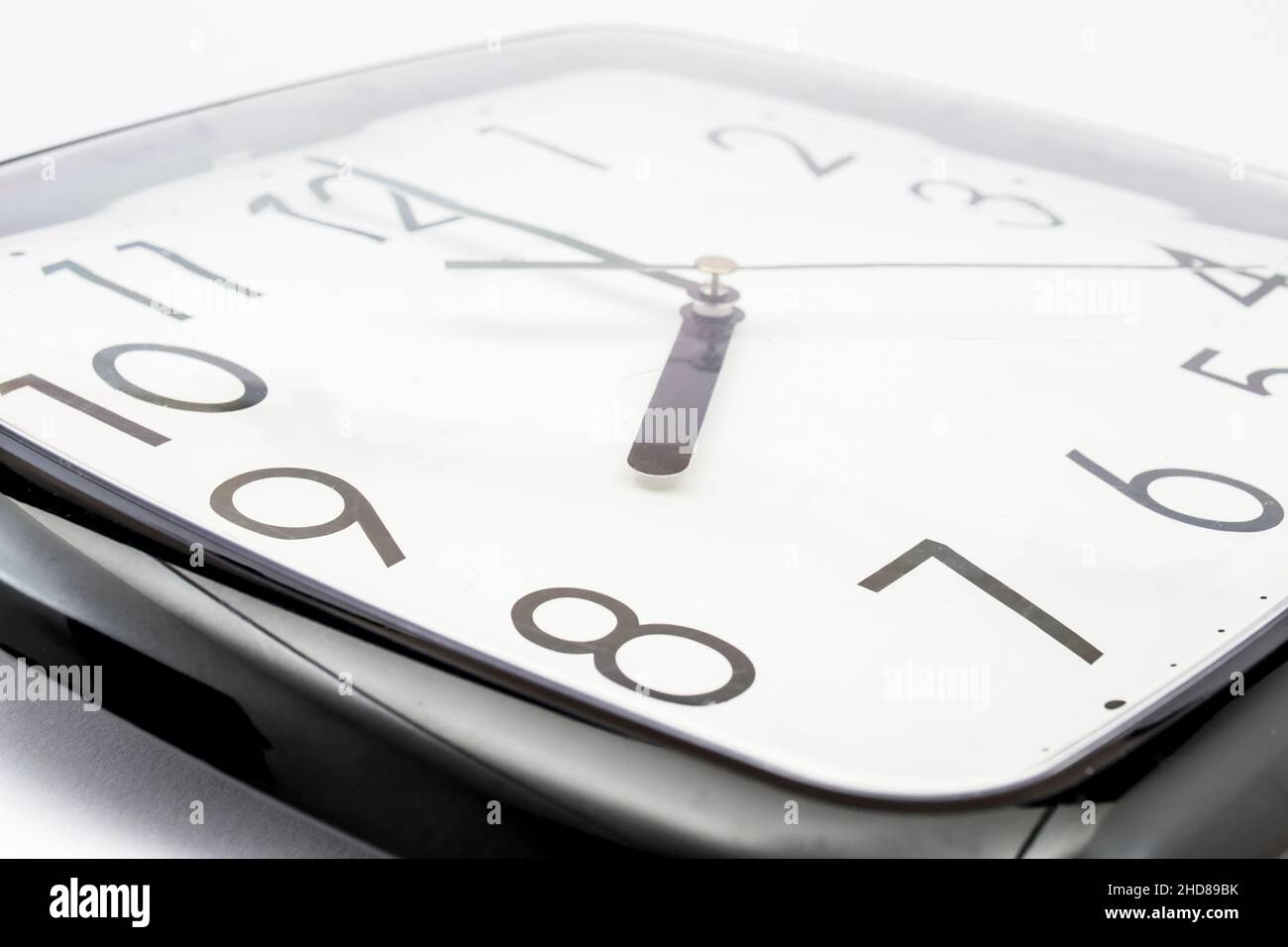 Black classic clock on isolated white background Stock Photo - Alamy