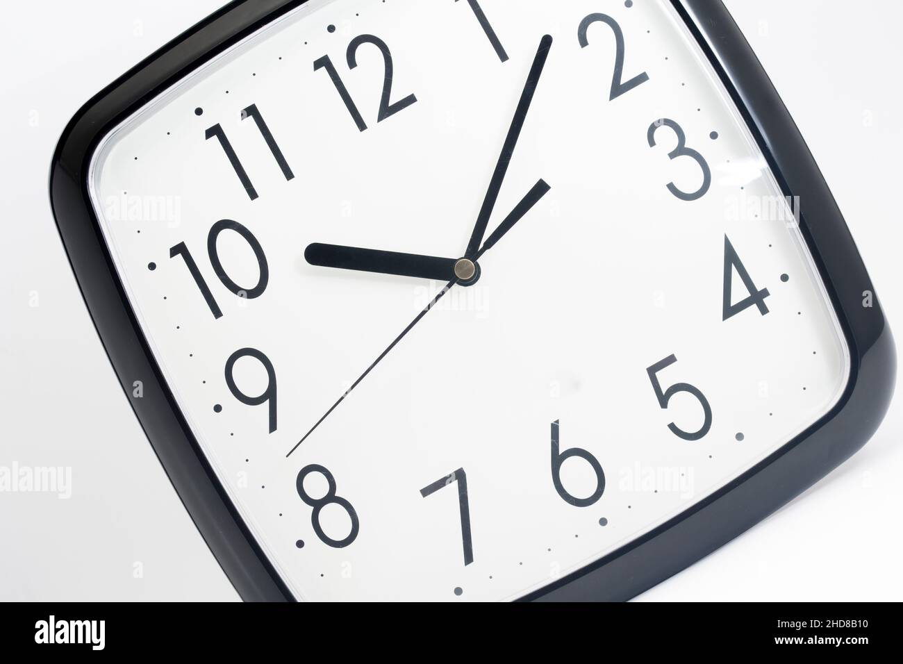 Black classic clock on isolated white background Stock Photo - Alamy