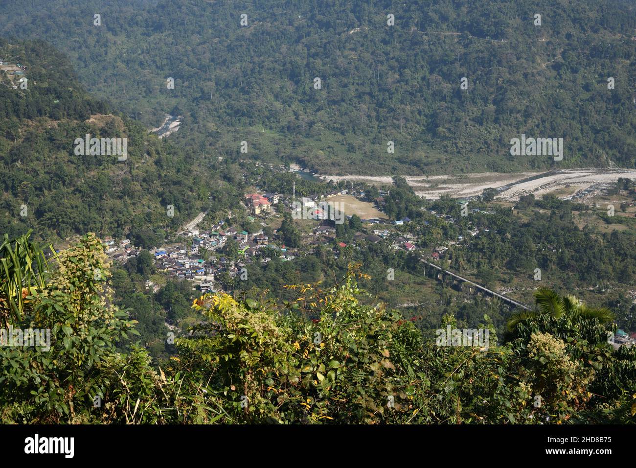 Indian village beside river Jaldhaka seen from Dalgaon viewpoint. Kalimpong, West Bengal, India. Stock Photo