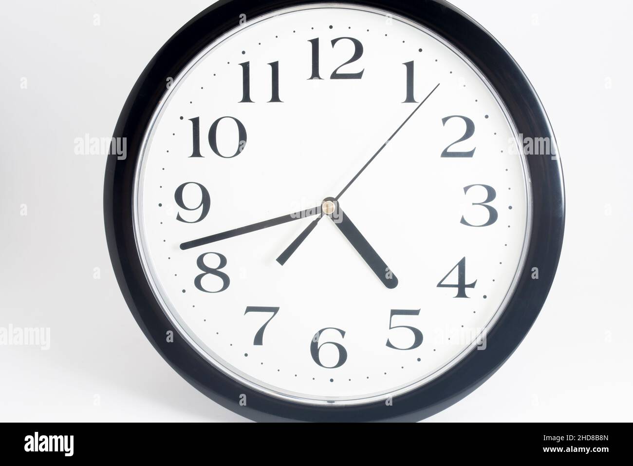 Black classic clock on isolated white background Stock Photo - Alamy