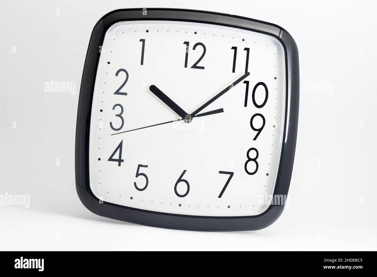 Black classic clock on isolated white background Stock Photo - Alamy