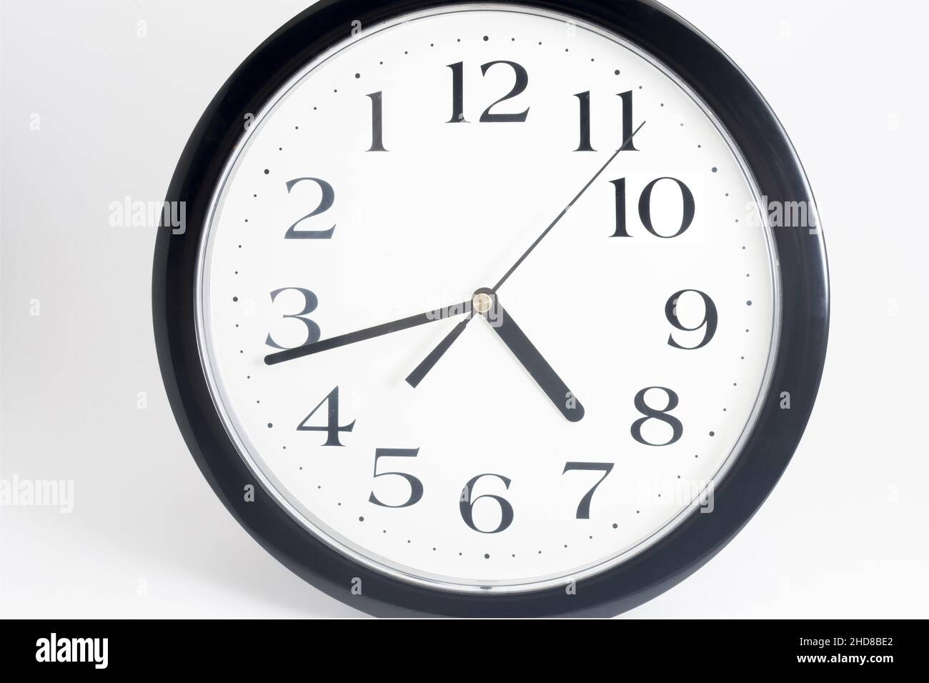 Black classic clock on isolated white background Stock Photo - Alamy