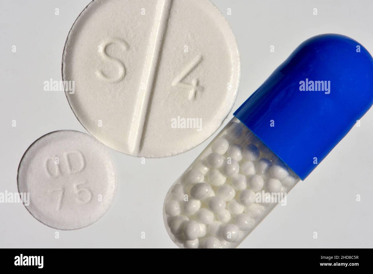 Painkillers: Ibuprofen capsule, Co-codamol tablet (S4) and dispersible Aspirin (OD 75) Stock Photo