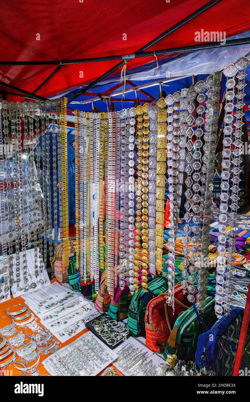 Display of metalwork belts, souvenirs and jewellery in the walking