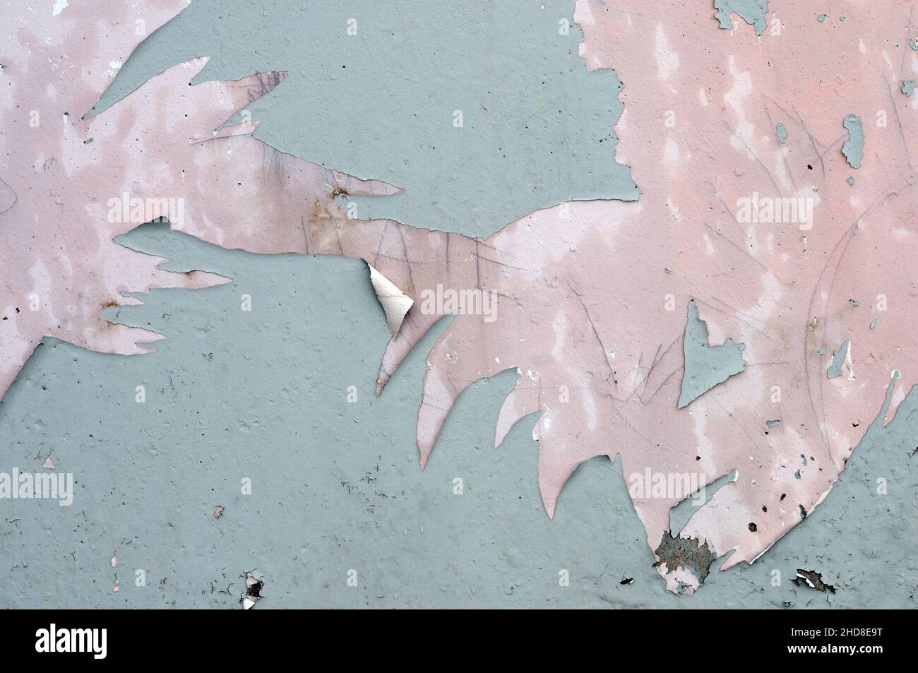 Paint peeling off concrete wall. Suitable as background or texture
