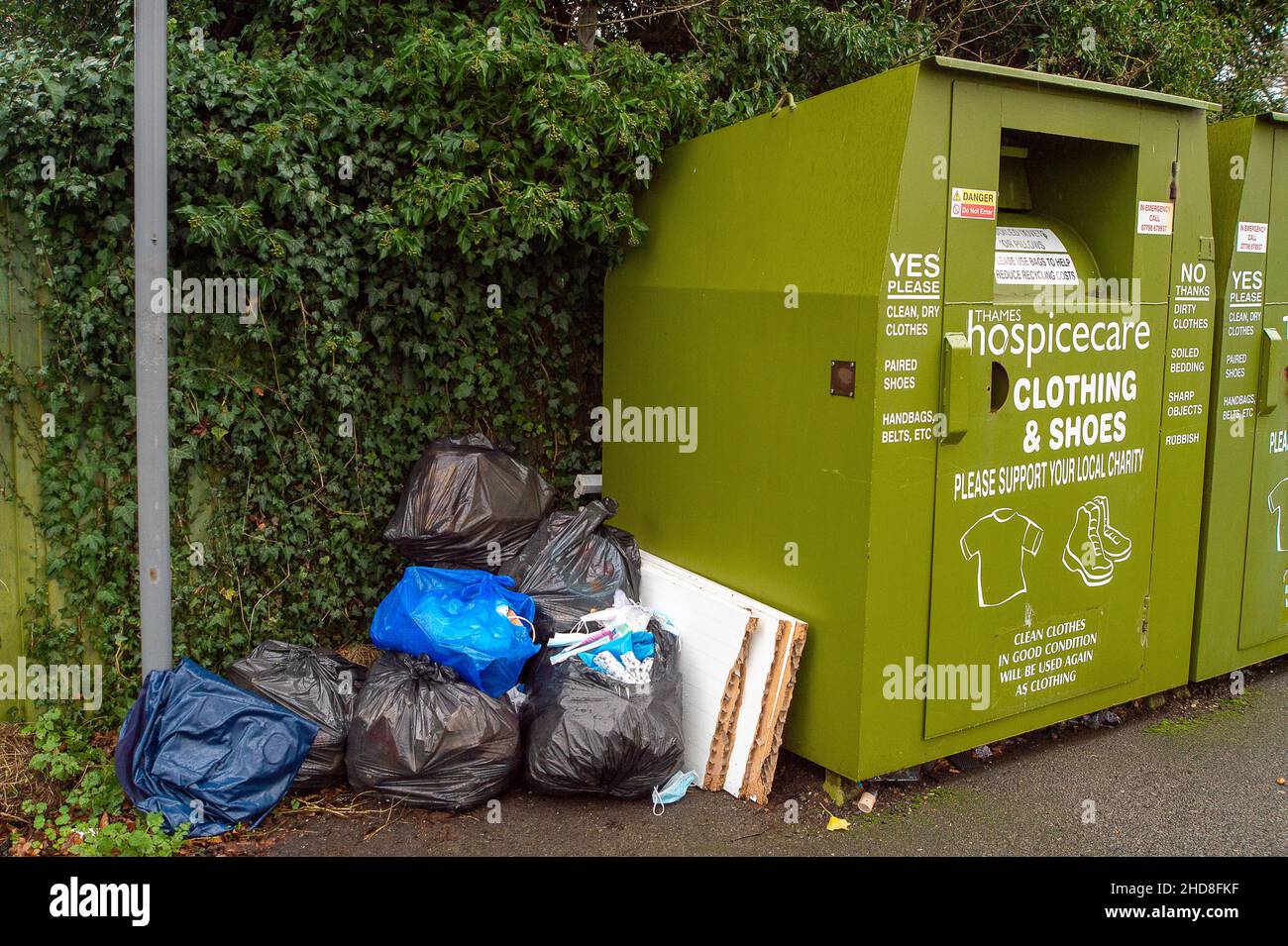Windsor, Berkshire, UK. 4th January, 2022. Despite waste collection services in Windsor working as normal post the Christmas holidays, some people are still choosing to illegally fly tip their rubbish next to charity collection points. Credit: Maureen McLean/Alamy Stock Photo