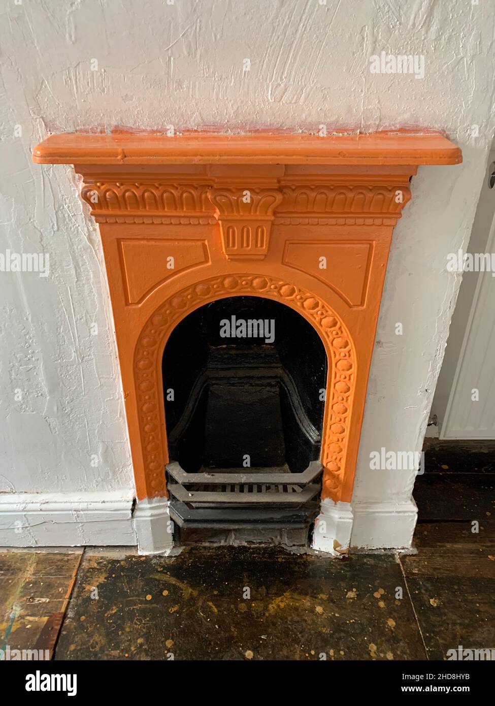 Victorian fire place in a house in Northampton UK old style round hath