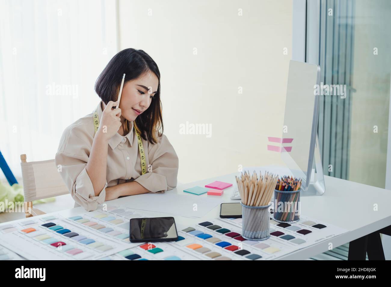 Successful asian fashion designer hi-res stock photography and images ...