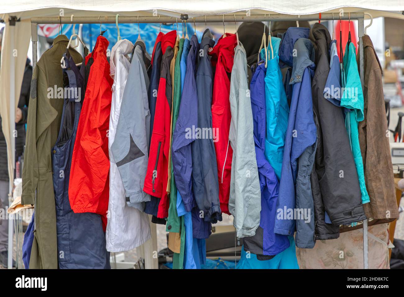 Rain Coats Jackets Gear Clothing for Bad Weather Rack Stock Photo