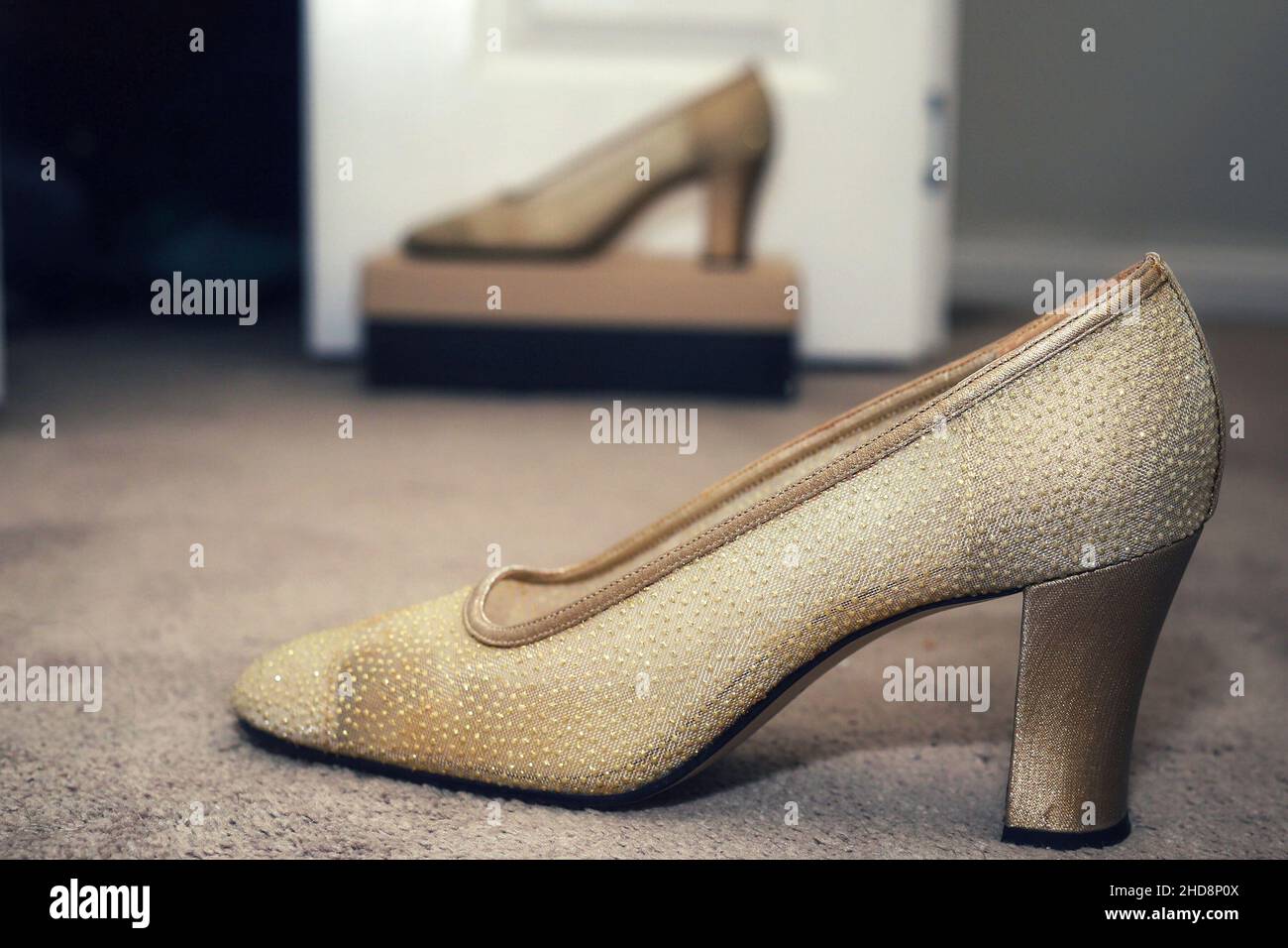Gold high heel hires stock photography and images Alamy