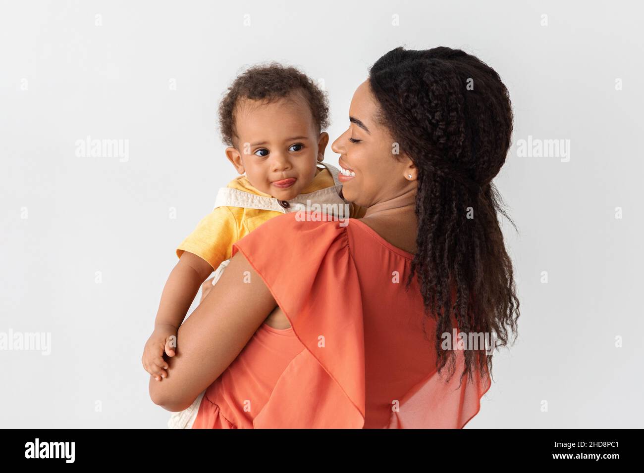 Black mom holding infant hi-res stock photography and images - Alamy