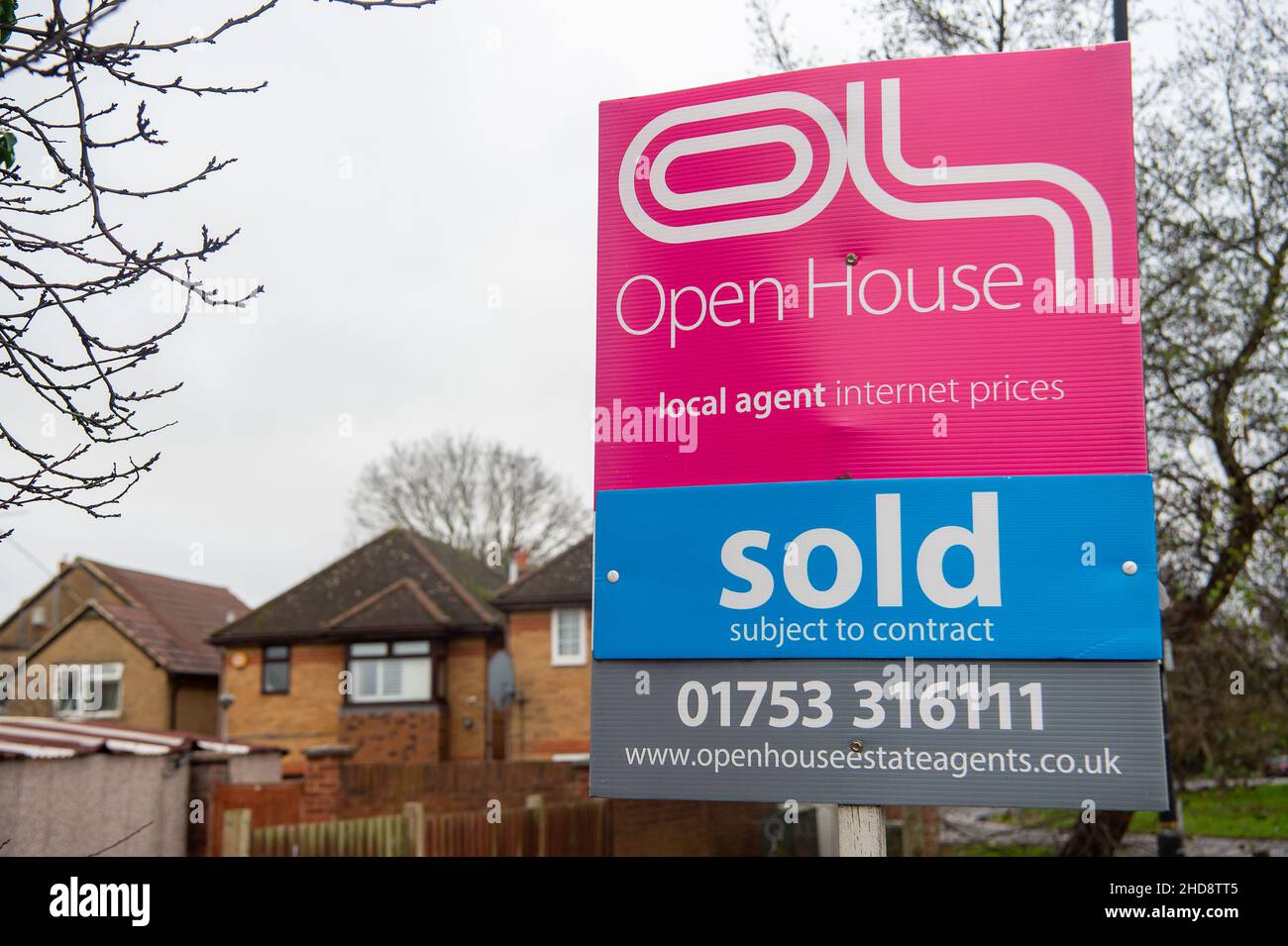 Slough, Berkshire, UK. 30th December, 2021. A sold sign outside a house