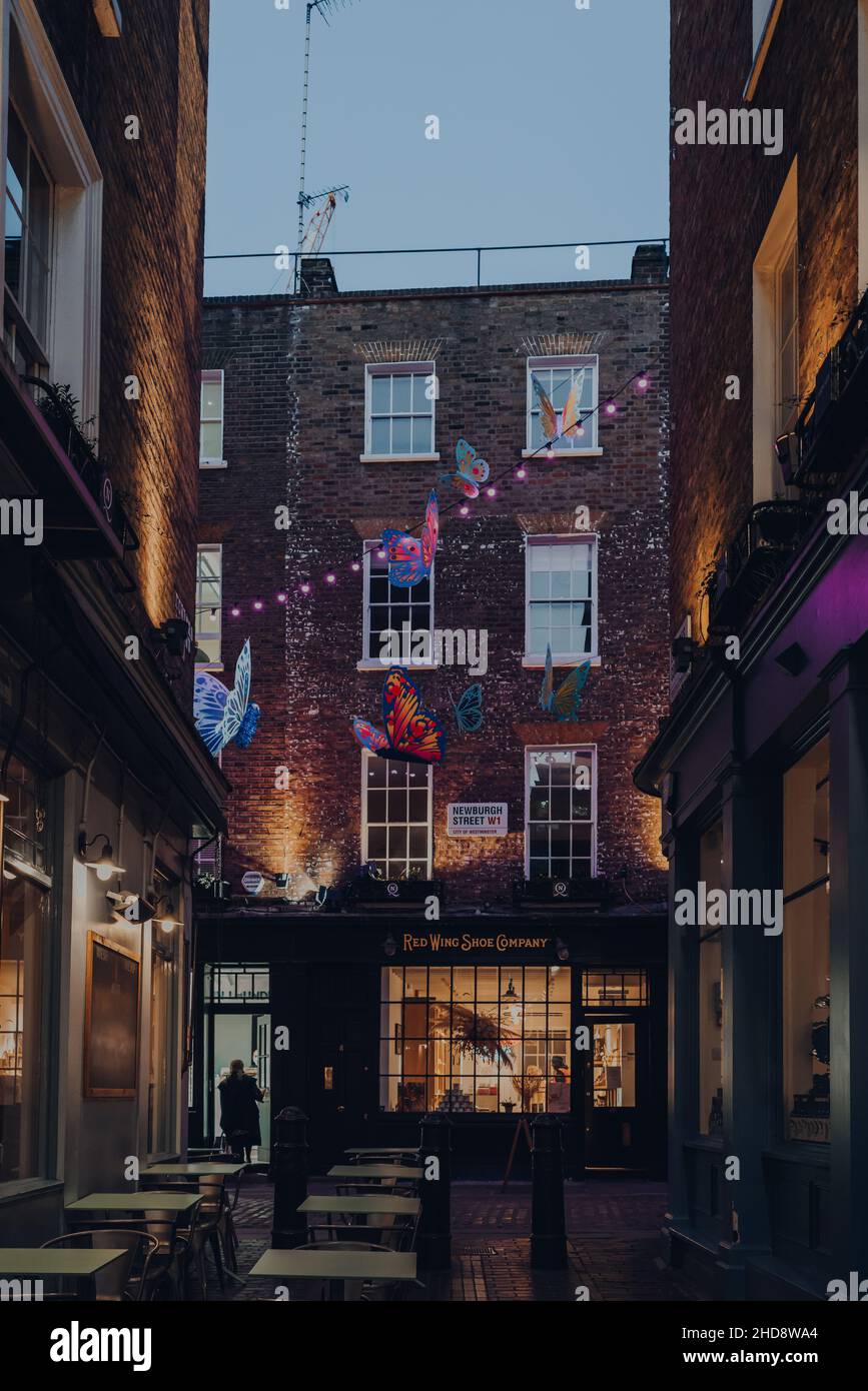 London, UK - November 23, 2021: Facade of Red Wing Show Company on Newburgh Street just off Carnaby Street, a famous pedestrianised shopping street in Stock Photo