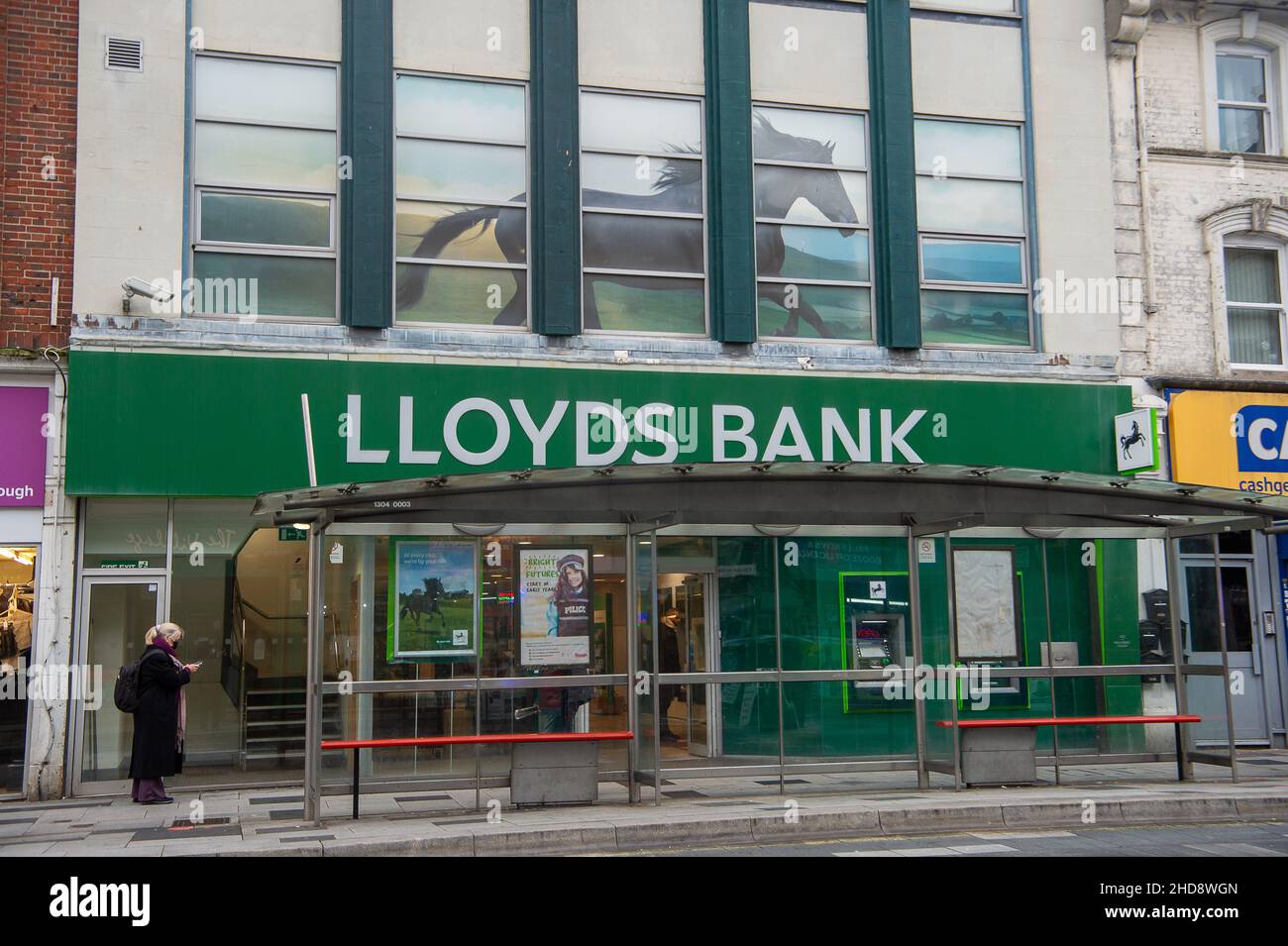 Slough, Berkshire, UK. 30th  December, 2021. The Lloyds Bank in Slough remains open but many high street banks have closed permanently during the Covid-19 Pandemic. Credit: Maureen McLean/Alamy Stock Photo