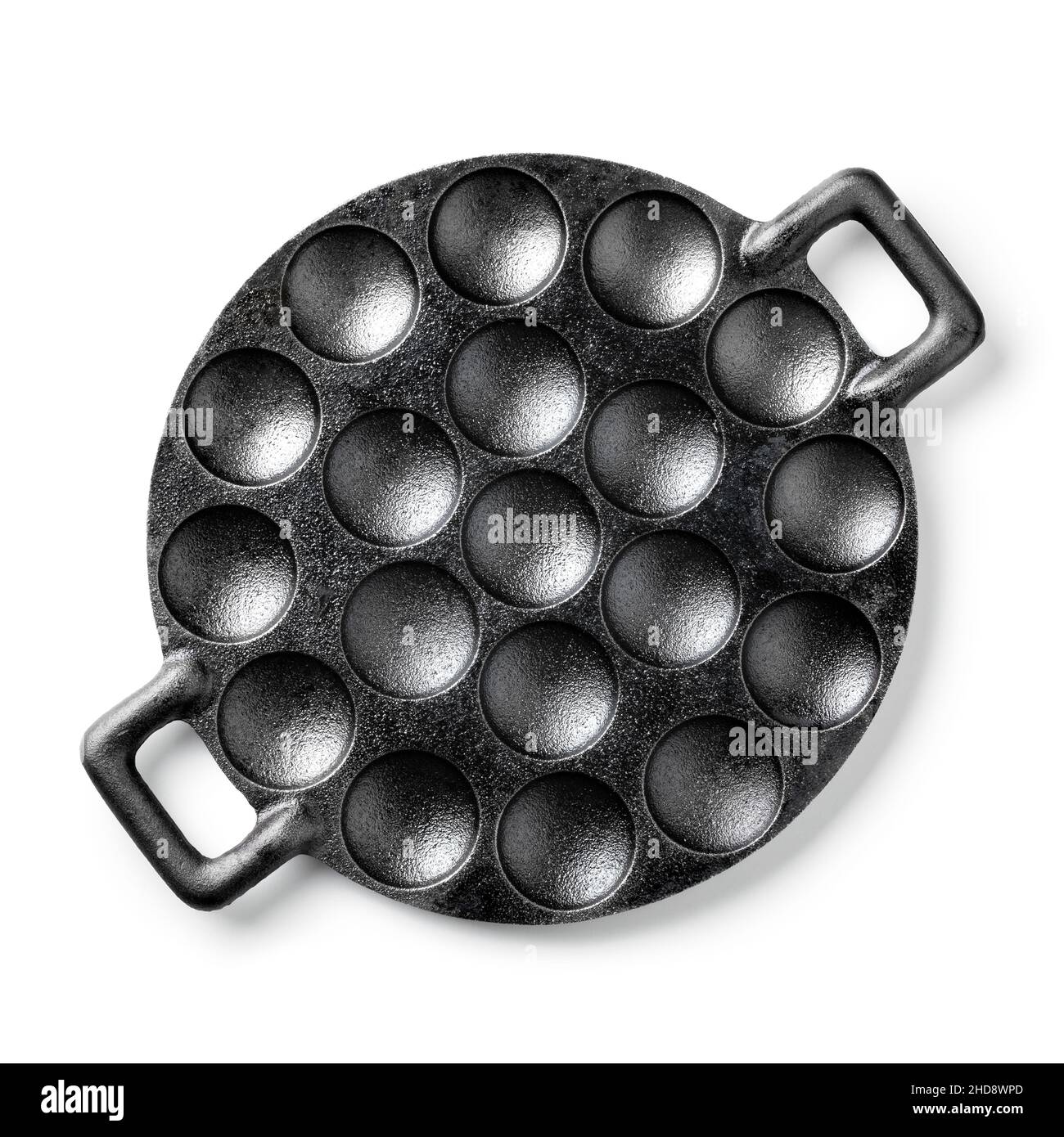 Traditional single black poffertjes cast iron baking pan isolated on white background Stock Photo