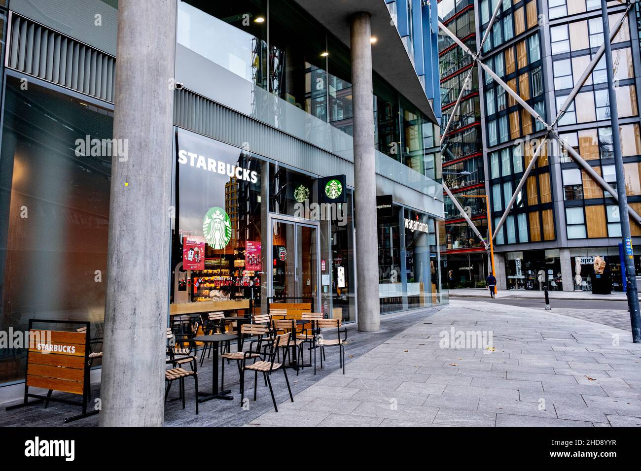 London England UK January 02 2022, Empty Starbucks Coffee Shop Blue Fin Building Southwark London With Outside Seating Stock Photo