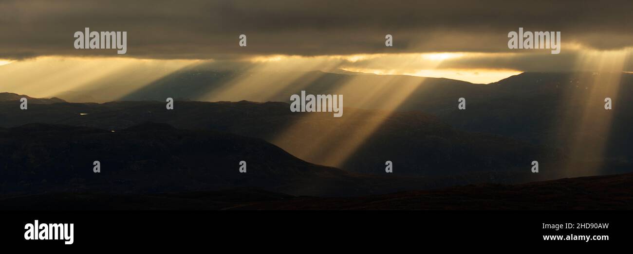 Crepuscular rays, Sutherland mountains, Scotland Stock Photo