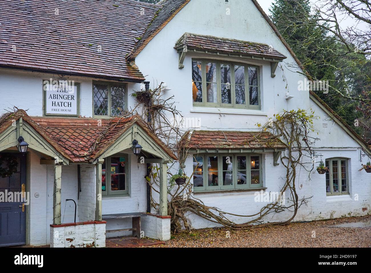The Arbinger Hatch pub in Surrey, a traditional cosy English pub in winter Stock Photo