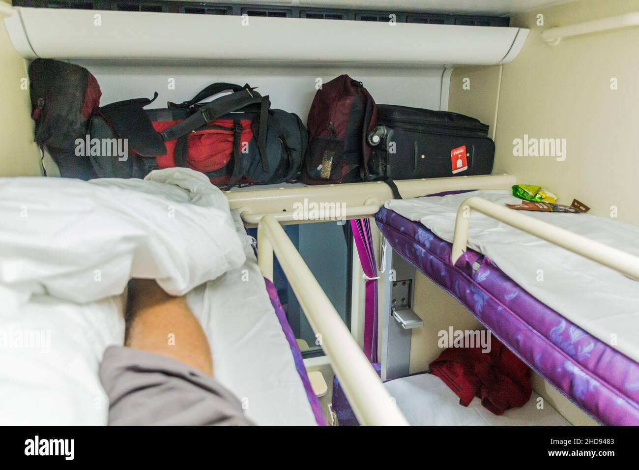 LANZHOU, CHINA - AUGUST 25, 2018: Upper bunks of Hard Sleeper class train coach in China. Stock Photo