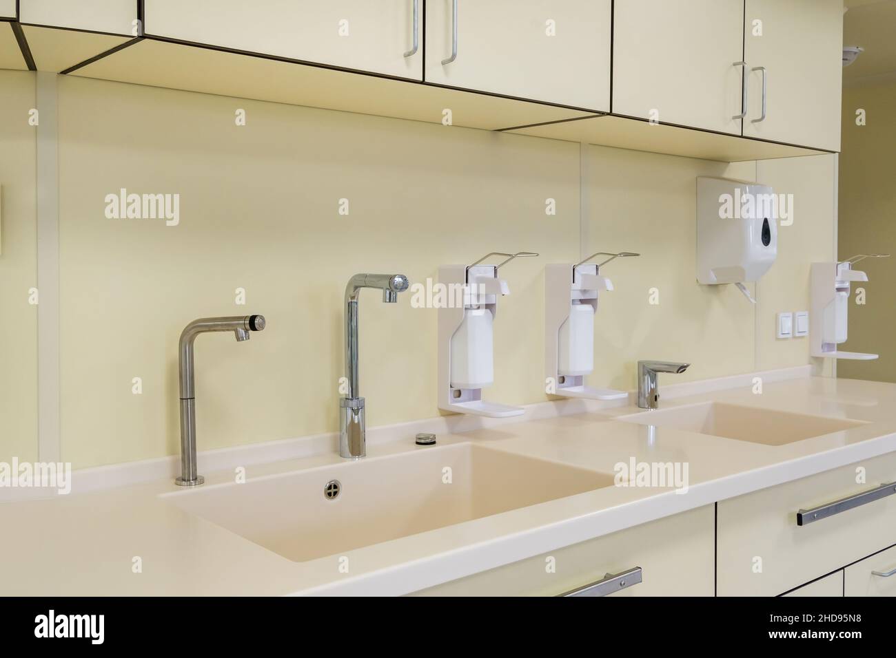 elbow soap and antiseptic dispenser or sanitizer wall mounted for hand