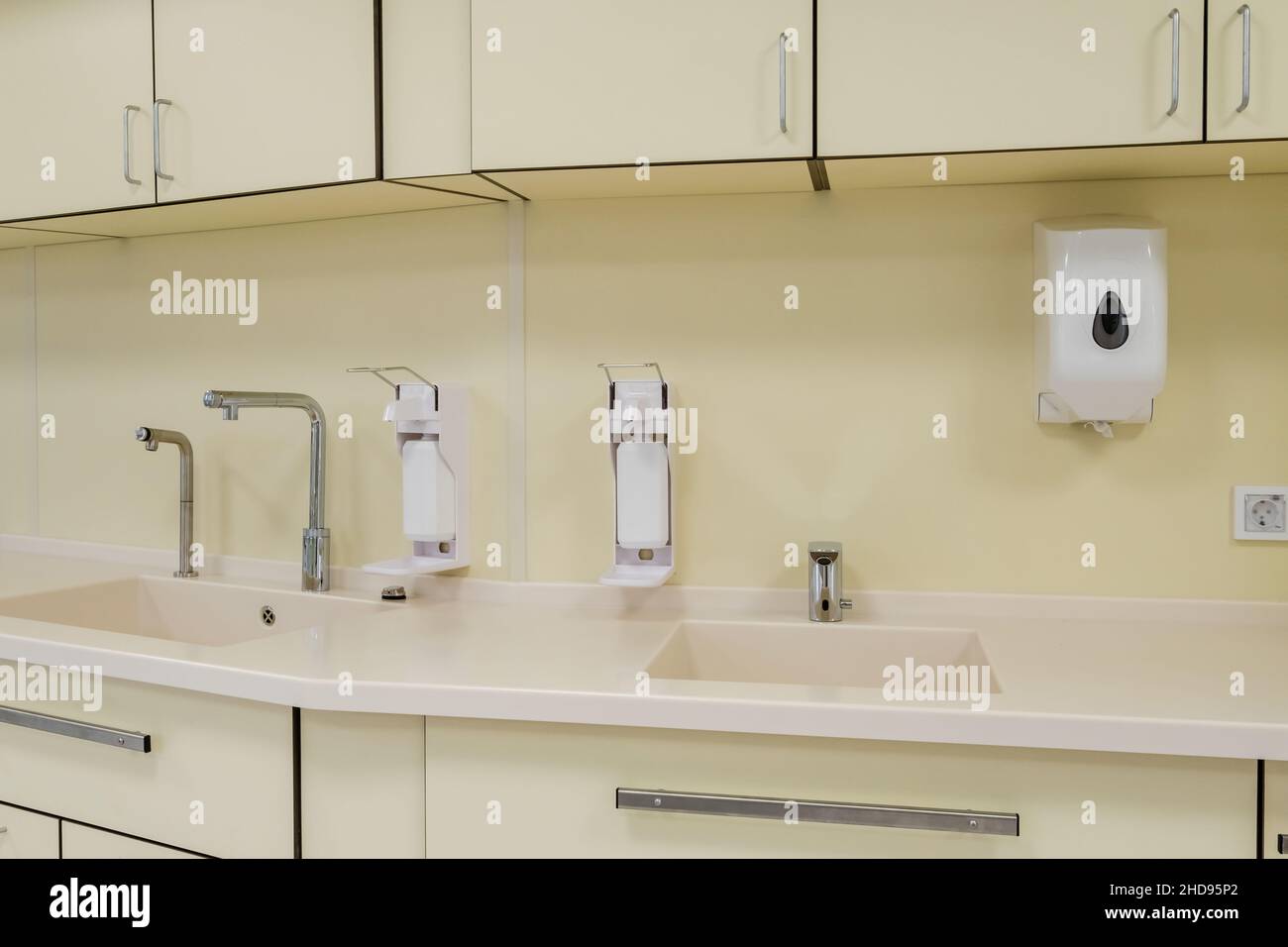 elbow soap and antiseptic dispenser or sanitizer wall mounted for hand