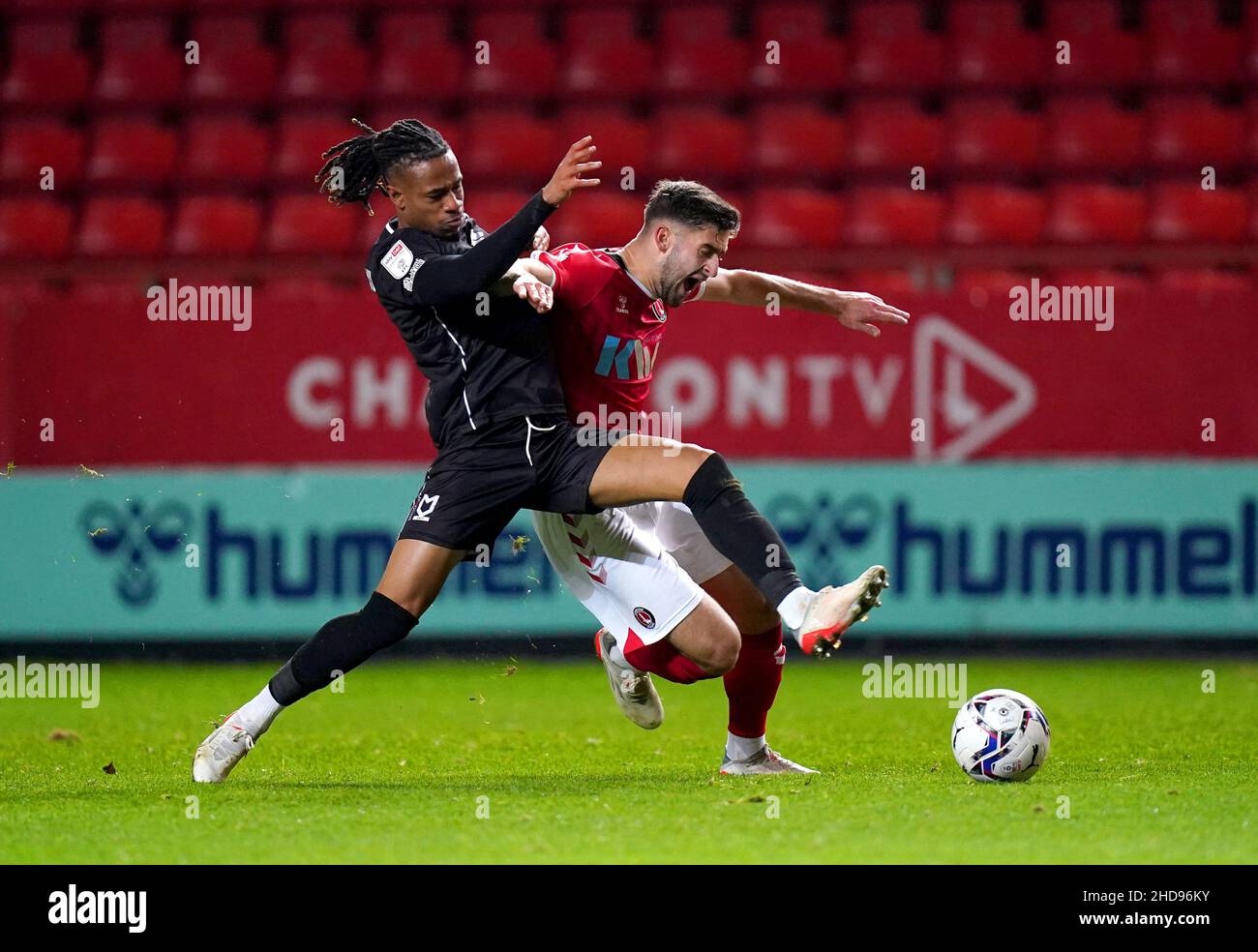 Milton Keynes Dons' David Kasumu (left) and Charlton Athletic's Aaron