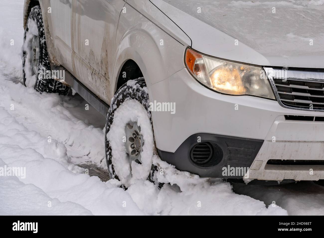 Car Tires in Snow. Oregon, Ashland, Winter Stock Photo