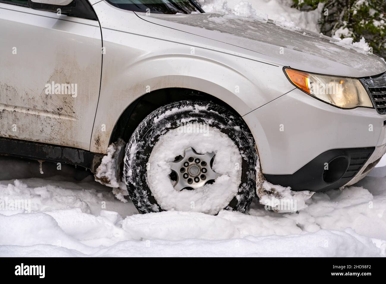 Car Tires in Snow. Oregon, Ashland, Winter Stock Photo