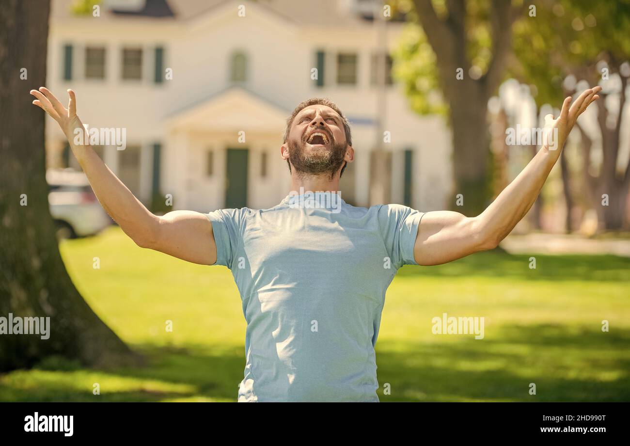 full of happiness. real estate agent at house for sale. realtor welcoming visitors. Stock Photo