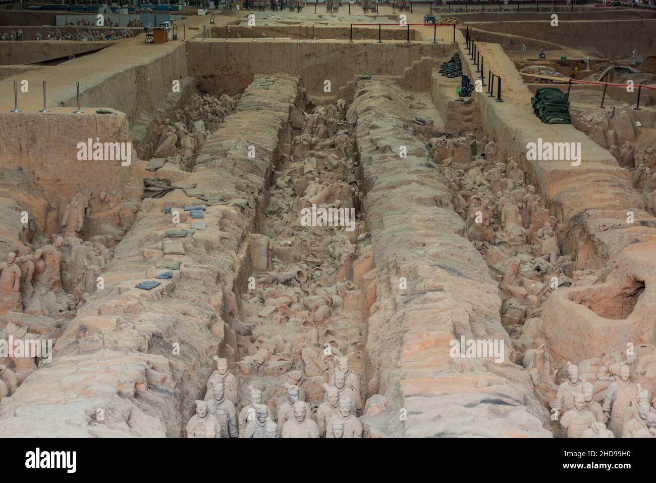 XI'AN, CHINA - AUGUST 6, 2018: Broken pieces in the Pit 1 of the Army of Terracotta Warriors near Xi'an, Shaanxi province, China Stock Photo