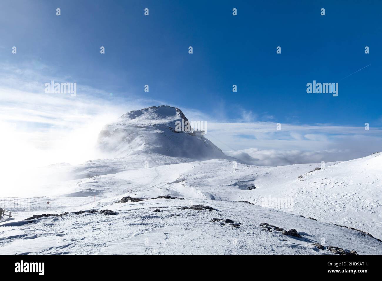 Dolomites - Cima Val di Roda and Cima Rosetta seen from the Rosetta refuge durting winter season and snowy landscape Stock Photo