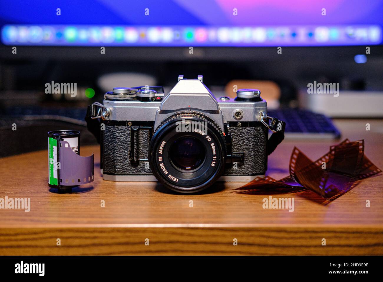 35mm Film camera with lenses and films negatives Stock Photo Alamy