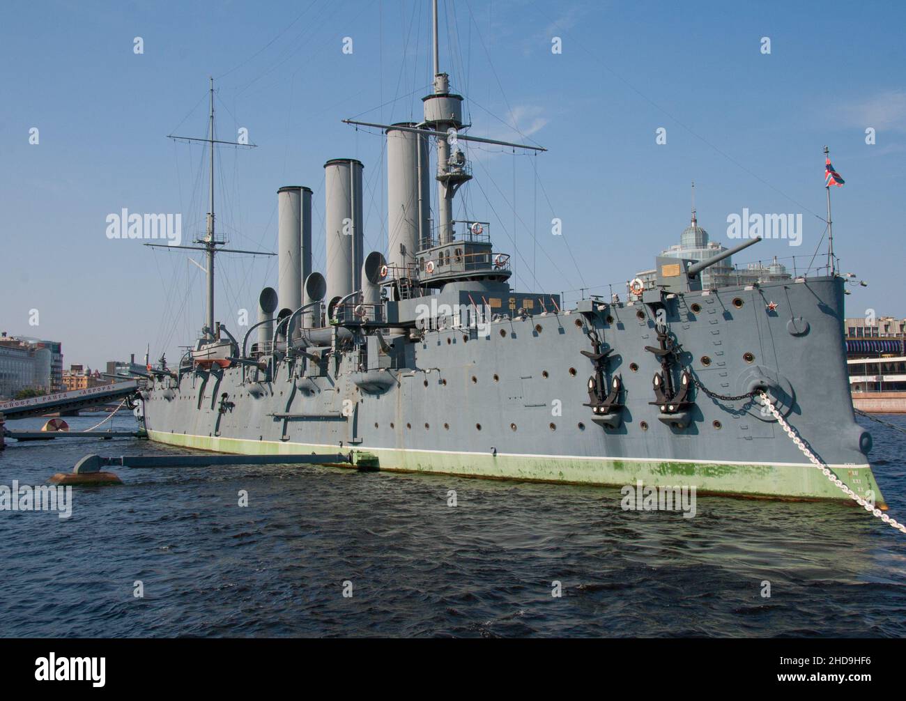 Cruiser Aurora moored at St Petersburg, Russia.  With the jack flag flying at the bow. Stock Photo