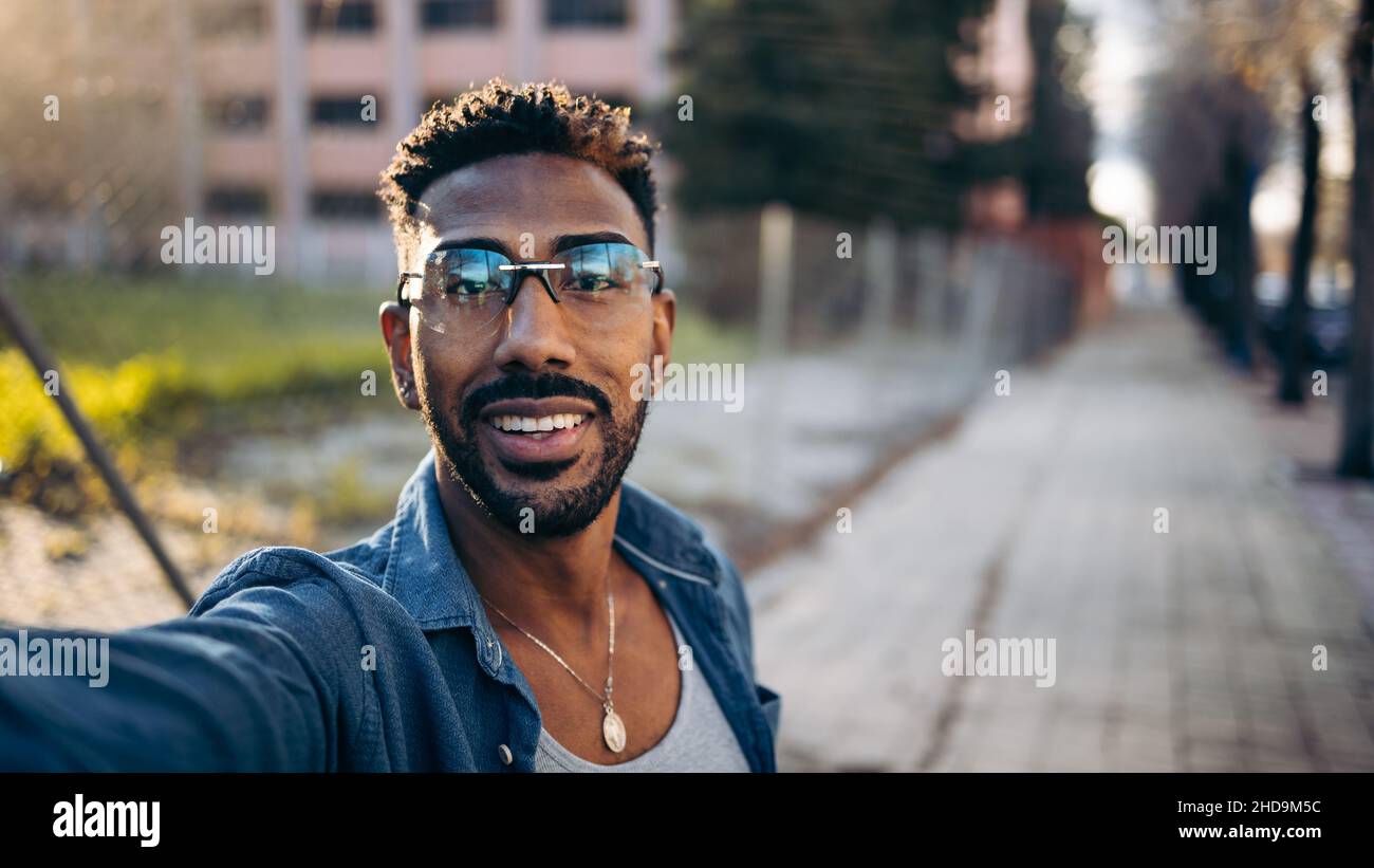Man on black afro hi-res stock photography and images - Alamy