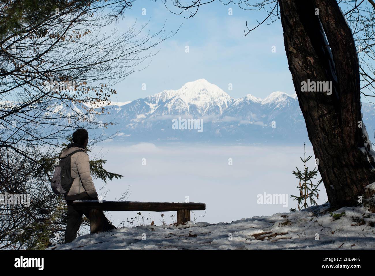 Hiker at the top of hill enjoying the view Stock Photo - Alamy