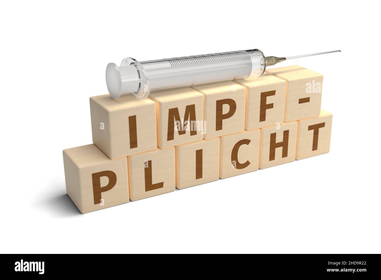 The German word Impfpflicht (mandatory vaccination) built from letters on wooden cubes. A syringe on top. Isolated on pure white. Stock Photo