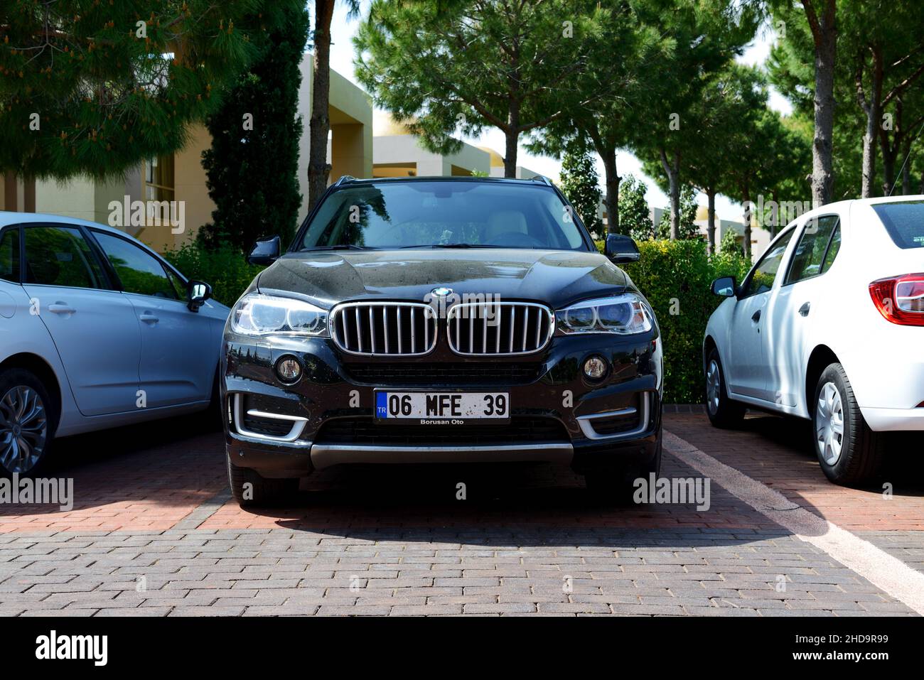 ANTALYA, TURKEY - APRIL 22: The BMW X5 car parked near modern luxury hotel on April 22, 2014 in Antalya, Turkey. Stock Photo