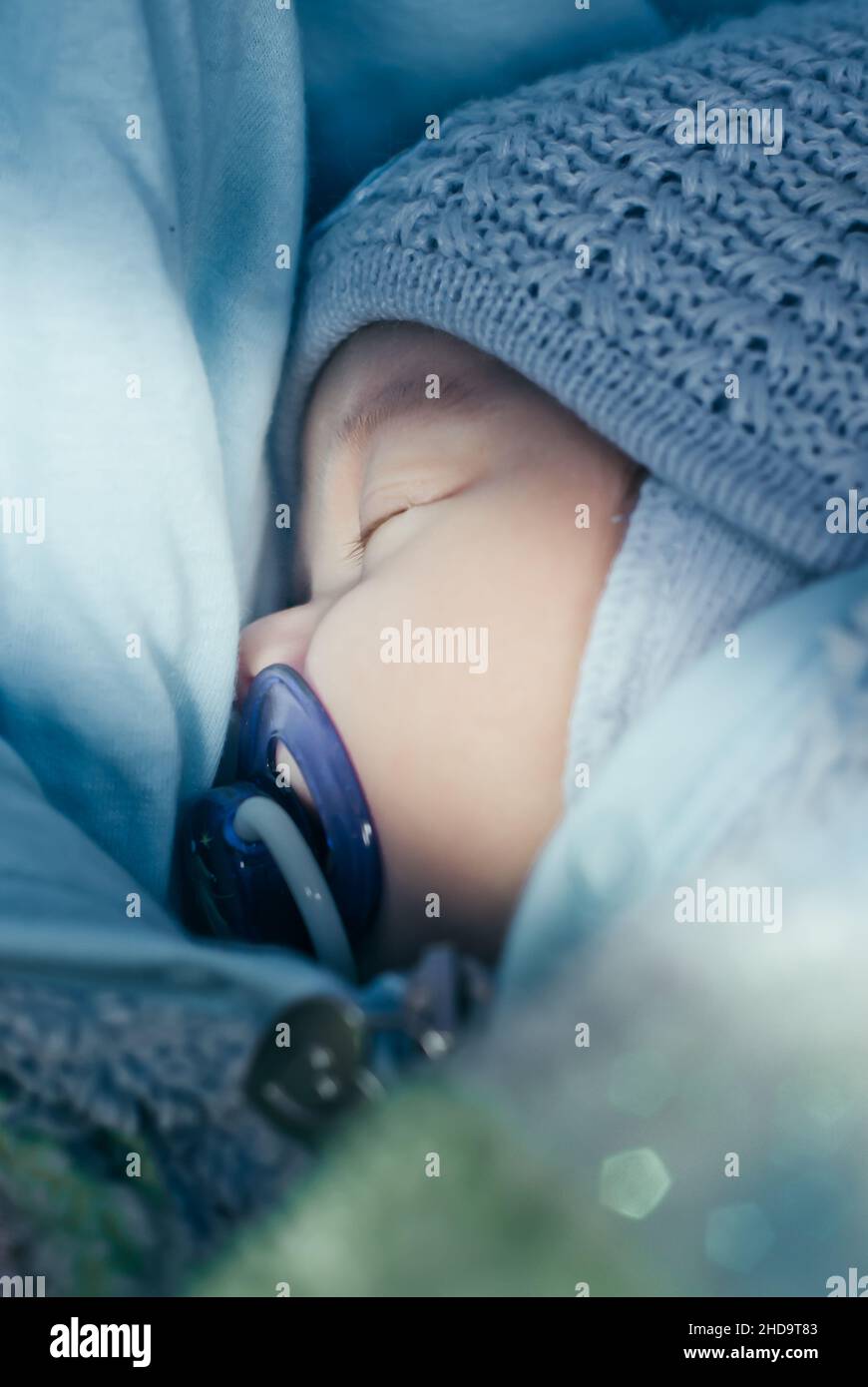 close-up portrait of sleeping baby with pacifier Stock Photo