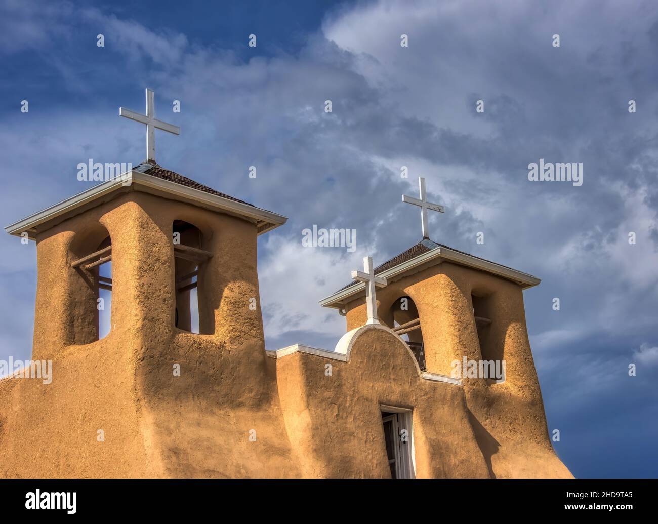 San Francisco de Asis Mission with white wooden crosses atop twin bell towers Stock Photo