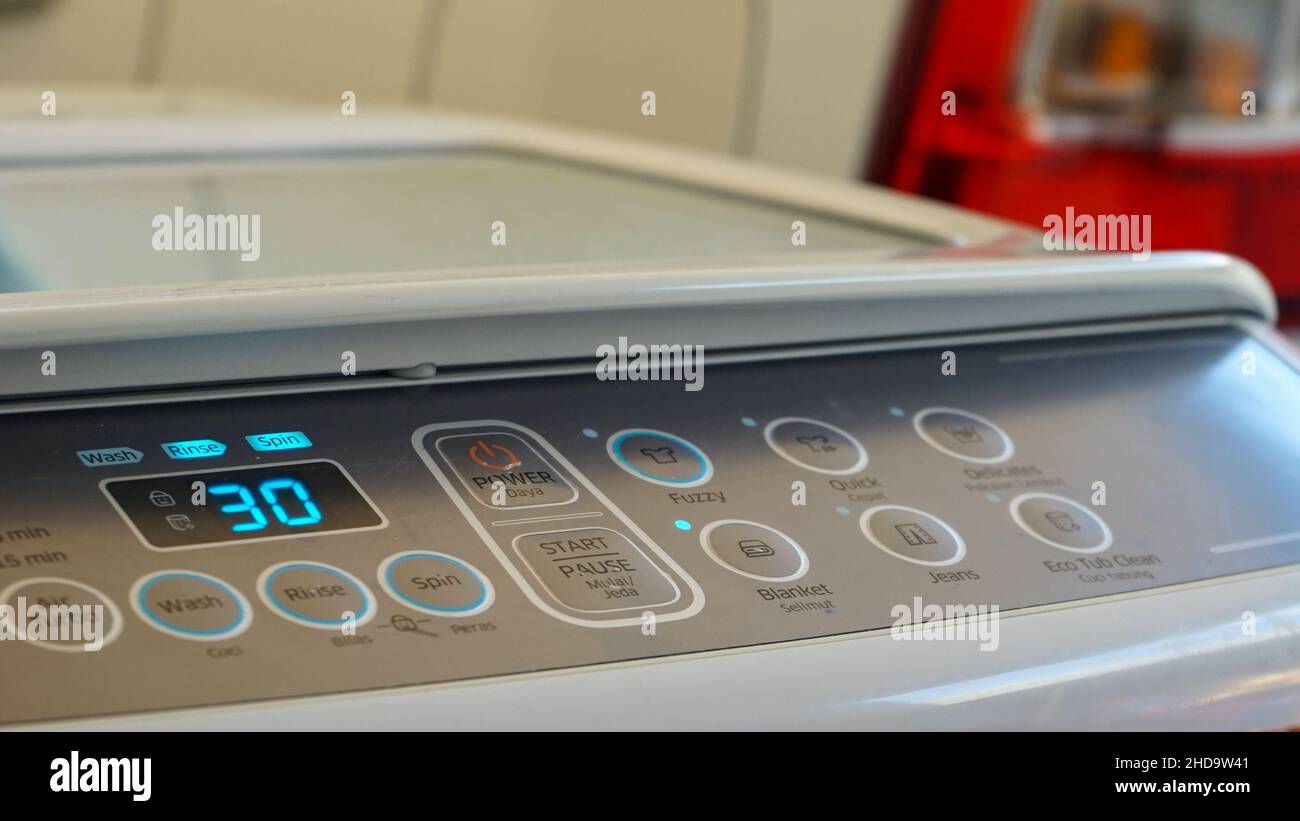 Close up of clothes washing machine button Stock Photo