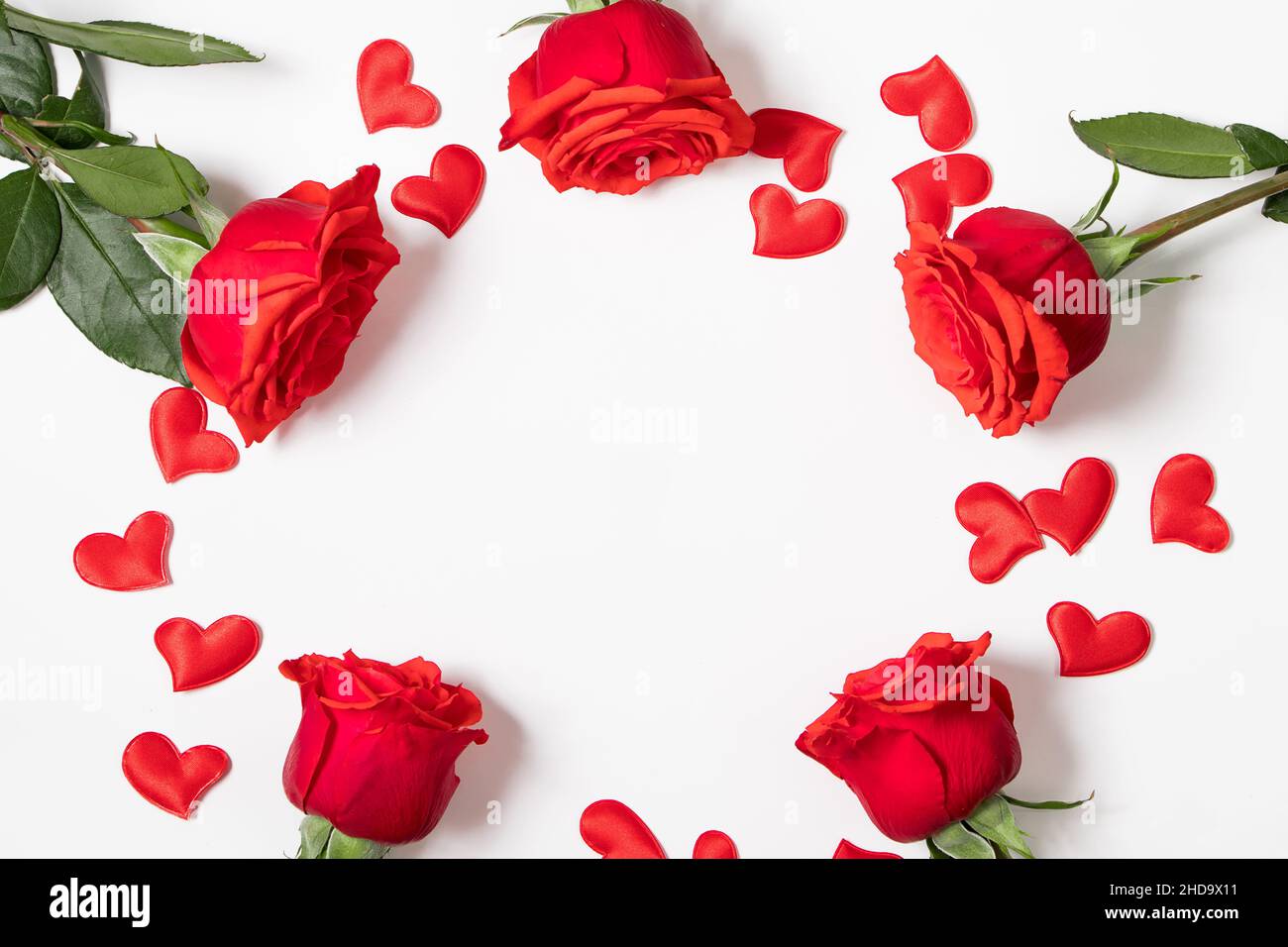 Frame from red hearts and roses on white background. Valentine's day ...