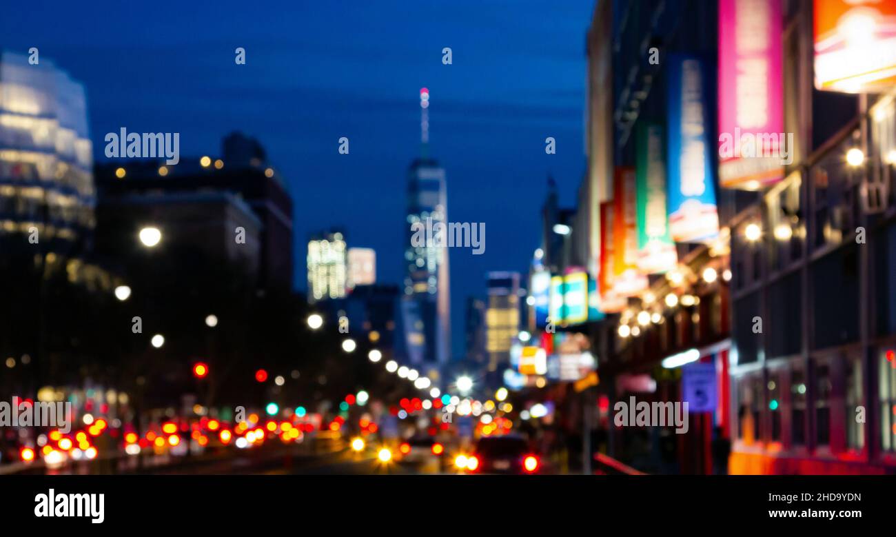 New York City night street scene at Chelsea Pier with abstract blurred ...
